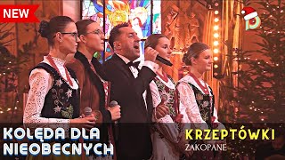 Kadr z teledysku Kolęda dla nieobecnych tekst piosenki Marcin Miller & Mała Armia Janosika