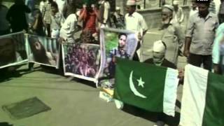 Youth wave Hafiz Saeed posters, ISIS & Pak flags adducing agitation against govt