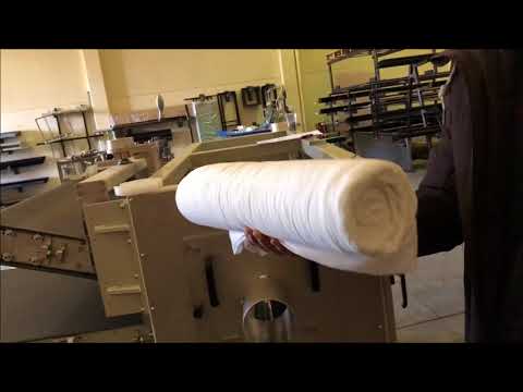 ME303 máquina enrolladora de almohadas y edredones