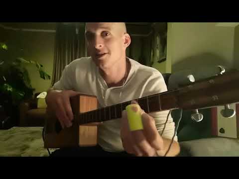 Cigar box guitar lesson, on angled slide technique, for 4 strings #cigarboxguitarlessons