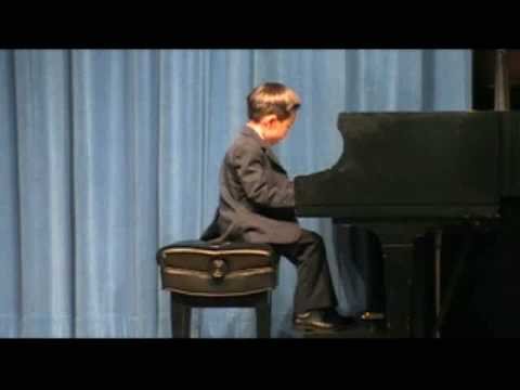5 year old Kevin playing piano