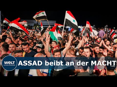 MENSCHEN IN SYRIEN JUBELN: Assads Anhänger feiern die Wiederwahl des Diktators I WELT News