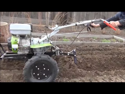 мотоблок пахарь 15 лс ( пашем плугом)