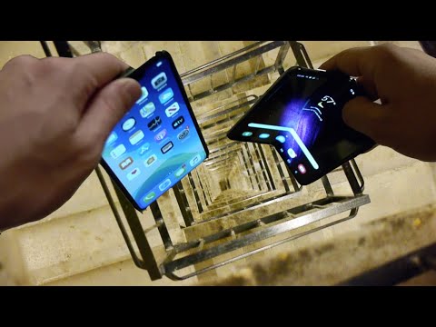 Dropping Samsung Galaxy Fold vs iPhone 11 Pro Max vs Nokia 3310 Down Spiral Staircase - 20 Stories