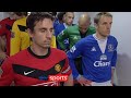 Gary & Phil Neville ignore each other in the tunnel