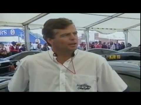 Derek Warwick interviewed in a paddock of XJR-15s