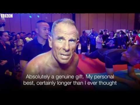 China plank  Policeman sets eight hour world record   BBC News