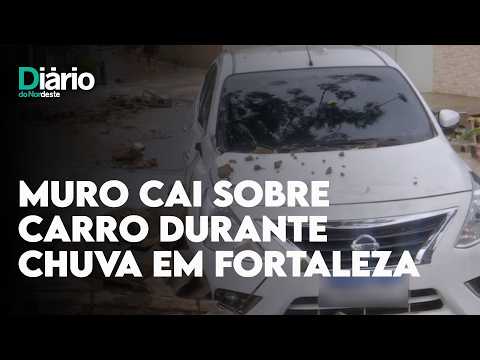 Muro cai sobre carro durante forte chuva no bairro Aerolândia, em Fortaleza