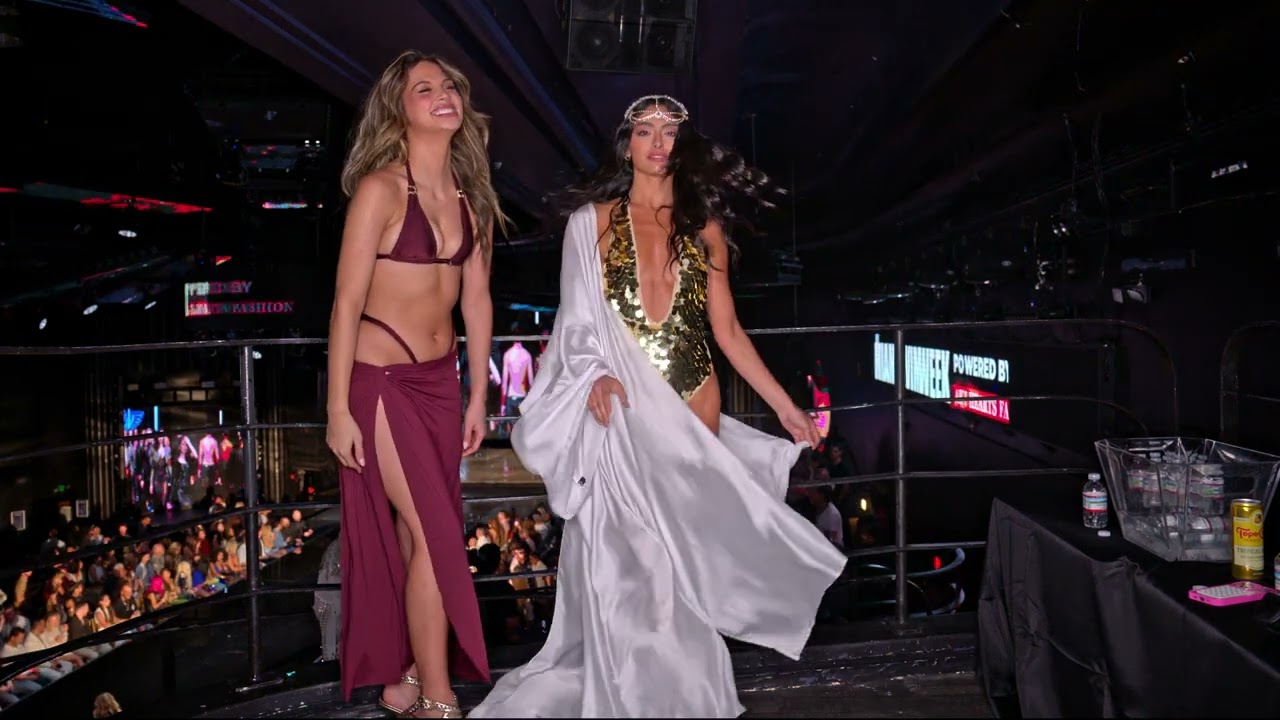 Models Ofir and Valentina pose @artheartsfashion Miami Swim Week