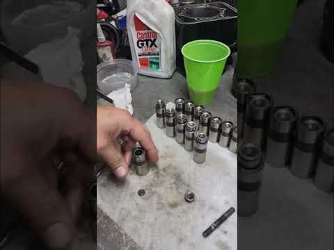 Whats inside of a hydraulic lifter?  rebuilding and cleaning stuck lifters #diy #automotive #engine