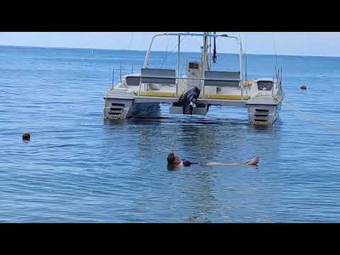 Joanne enjoying the water in Roatan, Honduras, on Half Moon Bay