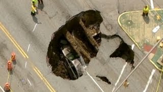 Giant Sinkhole in Ohio Swallows Car, Driver Trapped Inside