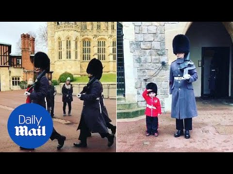 Four-year-old boy salutes next to guardsman at Windsor Castle - Daily Mail