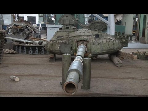 Battered military armour awaits repair in east Ukraine