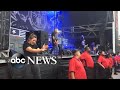 Sign language interpreter rocks out at heavy metal concert