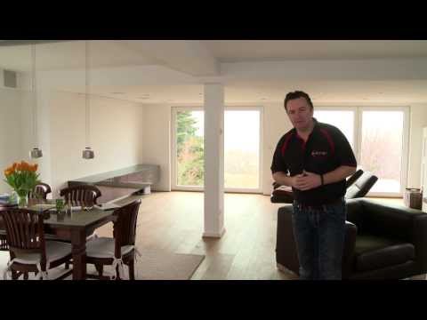 Vorstellung eines Wohnzimmers mit nahezu unsichtbarer Medientechnik