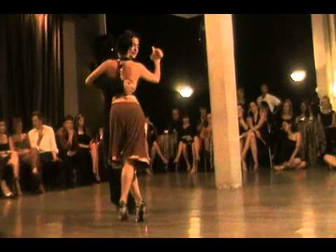  Carlos Espinoza  and  Pamela Ramos Aracena  are  dancing  to  the  tango  "  Tu Boca Mintio  "
