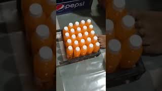 Manually Shrink film use to pack Juice/Soda bottles with Hot air gun