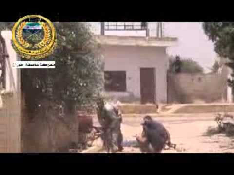 اشتباكات بين كتيبة شهداء الصنمين وكتيبة مجاهدي حوران مع قوات النظام على حاجز الكازية في بلدة كفر شمس في ريف درعا