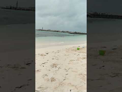 Girls snorkeling on deserted beach