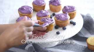 lemon blueberry cake with whipped cream cheese frosting