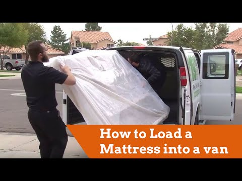 Part of a video titled How to Load a Mattress into a Cargo Van - YouTube