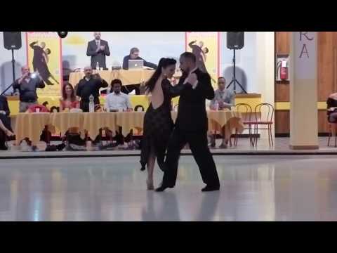  Cristina Sosa  and  Daniel Nacucchio  are  dancing  to  the  tango  "  Al Verla Pasar  "  by  Pedro Laurenz  at  Salonissimo Savona Tango Festival  in  2018