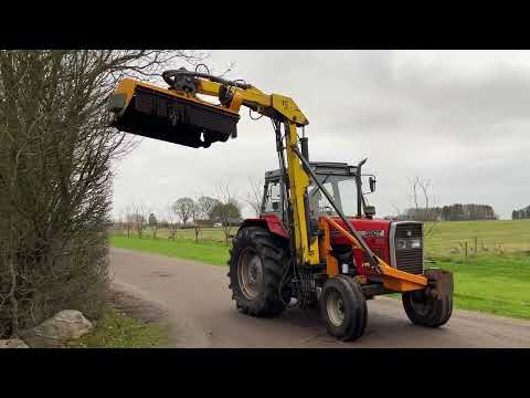 Video: Massey Ferguson 390 traktor med armklipper 1