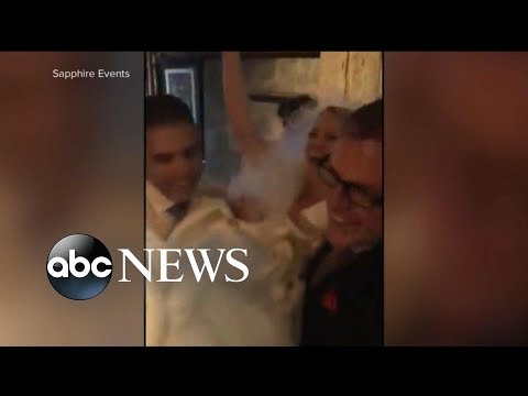 Couple get married in torrential rain