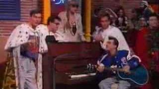 Tennessee - Llega La Navidad (Here Comes Santa Claus)