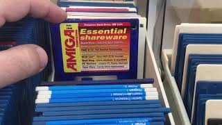 Commodore Amiga Cover disks with Commodore 64 music in the background