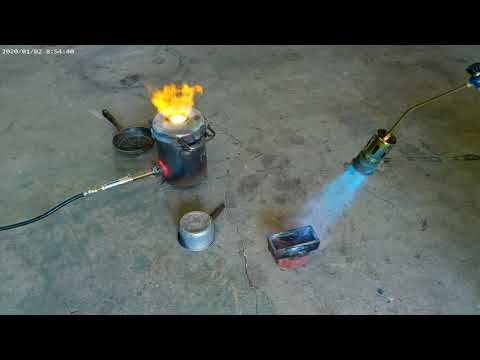 Melting/mixing copper, brass bullet casings, aluminum bullet casings, and aluminumbronze. Golden bar