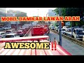 MOBIL DAMKAR LAWAN ARAH MEMBELAH KEMACETAN