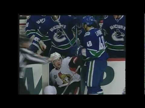 Maxim Lapierre gives Jesse Winchester a seat on the Canucks Bench