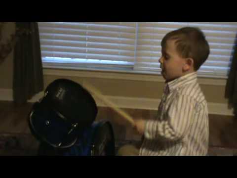 3 year old Cole playing the drums