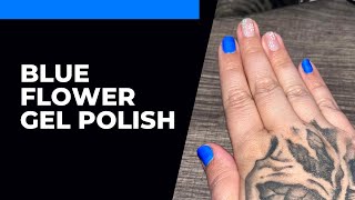 Navy blue and flowers nail design in matte gel polish
