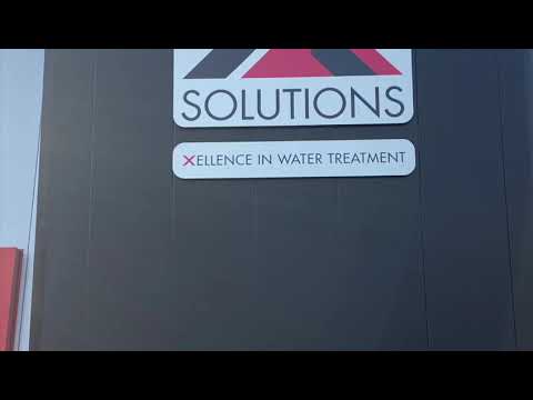 X2 Solutions staff and machines