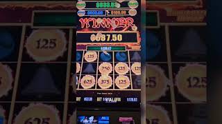 Big Win at the Casino: Jackpot and Retrigger Celebration