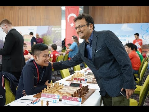 The Indonesian talent Novendra Priasmoro and his team at the Batumi Olympiad 2018