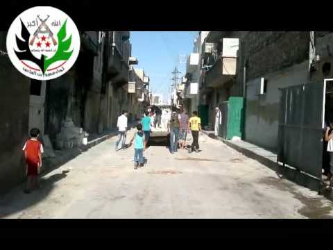 توزيع المعونات الإغاثية في حي طريق الباب في محافظة حلب من قبل لواء عمرو بن العاص