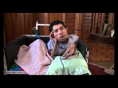 علي مرزوق من غزة :: مقعد وليس له أطراف ويحفظ القرآن
