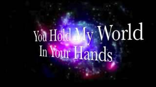 You hold my world in your hands with Lyrics