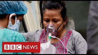 Hospitals in India run out of oxygen as its Covid cases hit world record levels - BBC News
