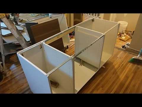 Part of a video titled EASY - How to Install an Ikea Kitchen Island - YouTube