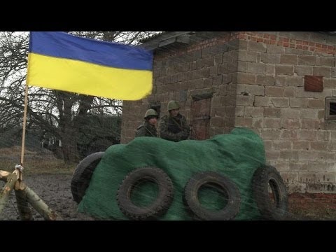Ukraine troops dig in at border in staredown with Russia