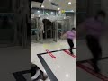 Strong winds push woman into building