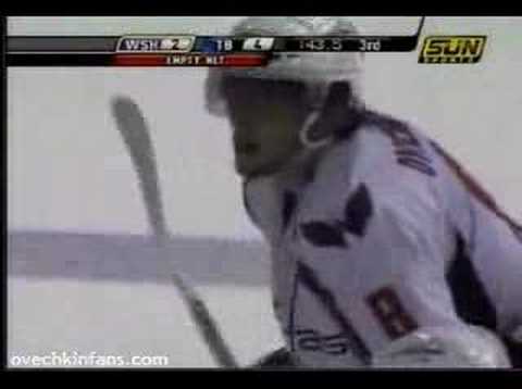 Alexander Ovechkin makes a save on an empty net