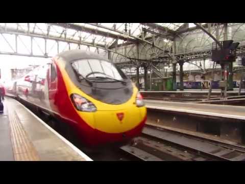 Virgin class 390050 Virgin invader departing Glasgow central for London Euston