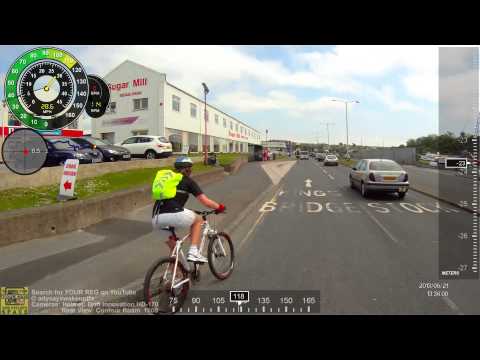 Silly Cyclist - Pulls Out Onto Dual Carriageway Without Looking - Near Collision