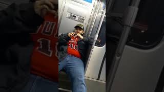 2 GD's smoking a cigarette on the train